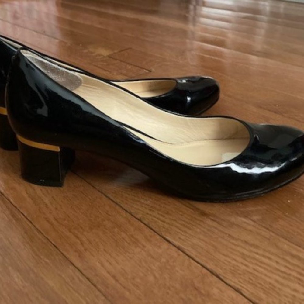 Vince Camuto Signature black patent leather heels with gold accents